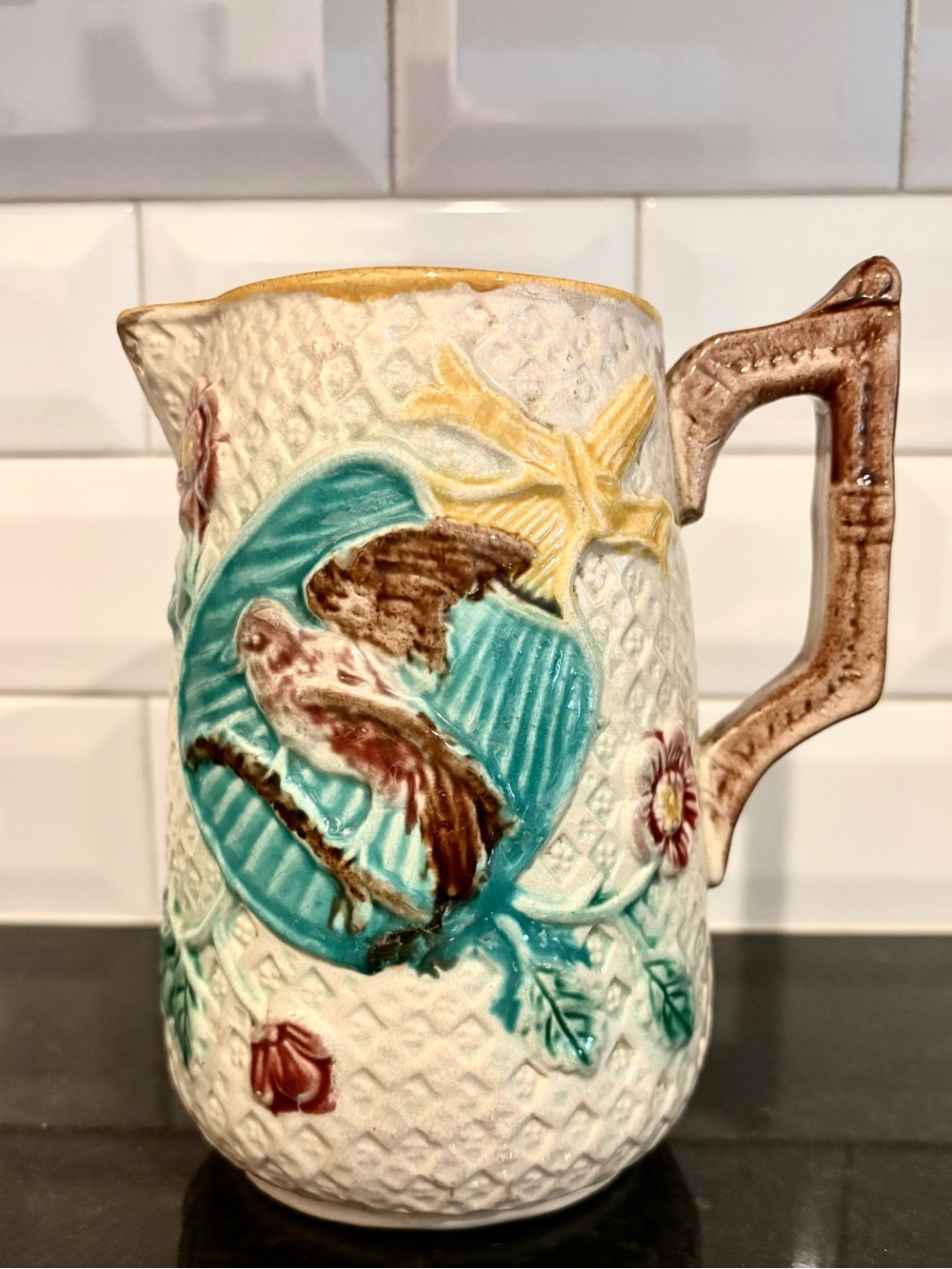 Antique Majolica Pitcher with birds on Fan in Turquoise, yellow and rose.